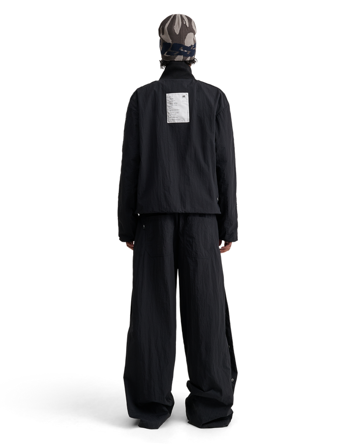 ALIS TEEFEY TRACK PANTS W/ LOGO TAPE Track pants