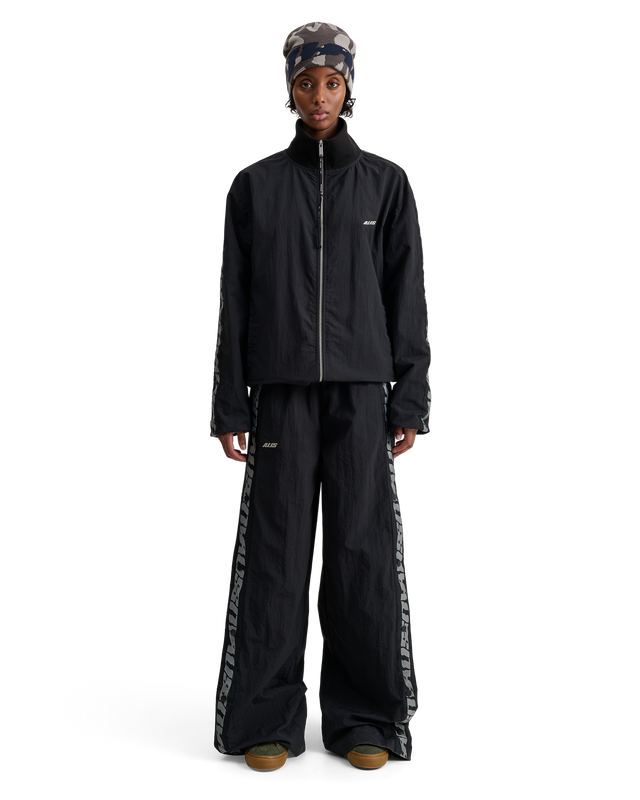 ALIS TEEFEY TRACK PANTS W/ LOGO TAPE Track pants
