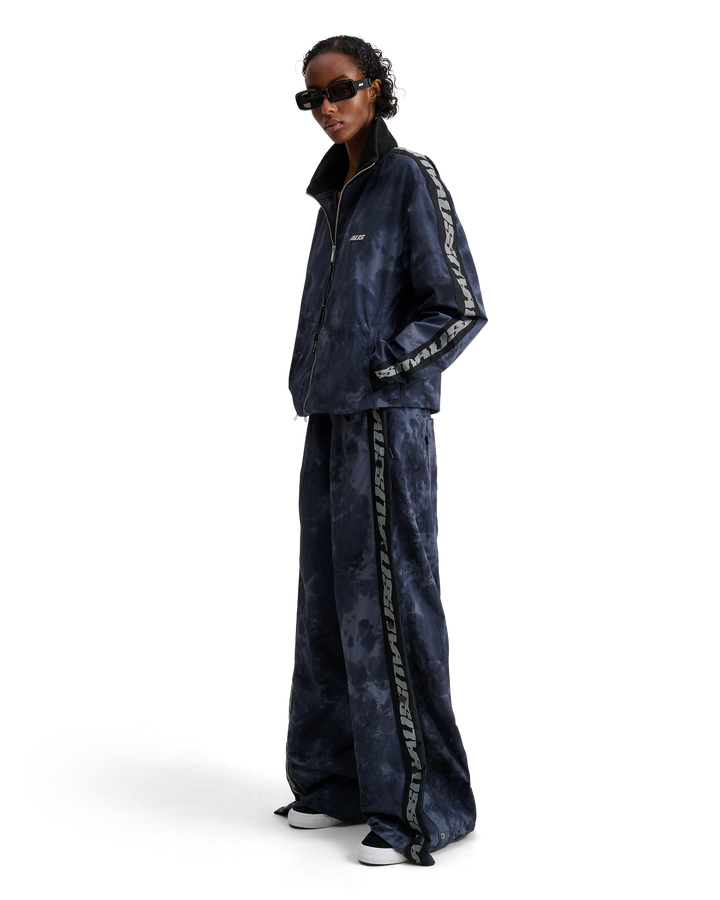 ALIS TEEFEY TRACK PANTS W/ LOGO TAPE Track pants