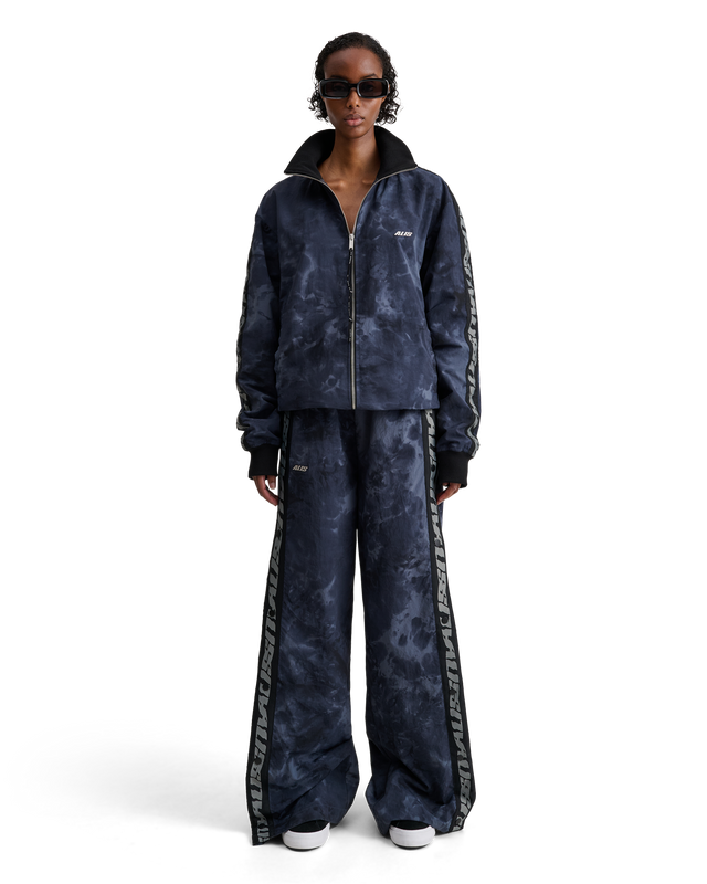 ALIS TEEFEY TRACK PANTS W/ LOGO TAPE Track pants